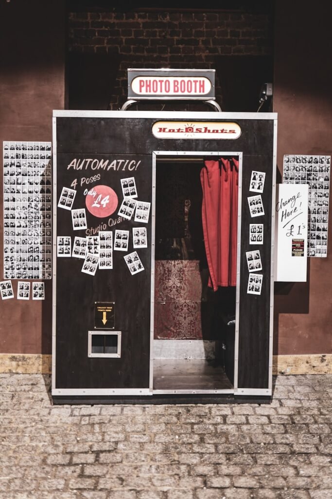 black and white photo booth showing open door